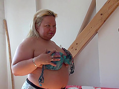 Older chubby mom is stripping down showing her beautiful body