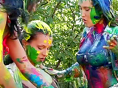 Lecherous amateur cowgirls playing with paint in an outdoors threesome