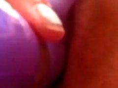 Attractive girlfriend poking her pussy hole with sex toy in amateur video